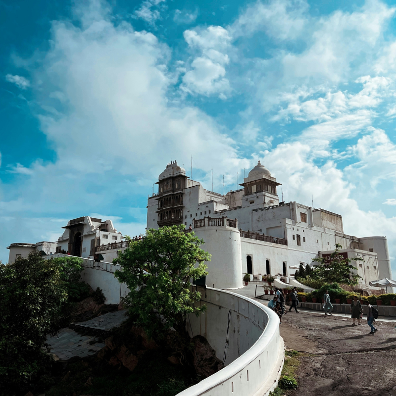 The white Monsoon Palace perched on a hill overlooking Udaipur lakes