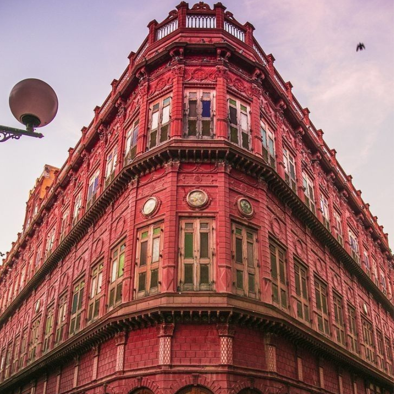 Intricate red sandstone carvings on the facade of Rampuria Haveli in Bikaner