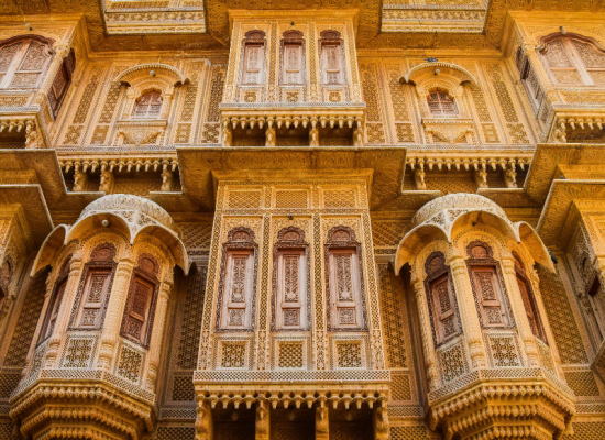 Detailed sandstone carvings of the five interconnected Patwon Ki Havelis